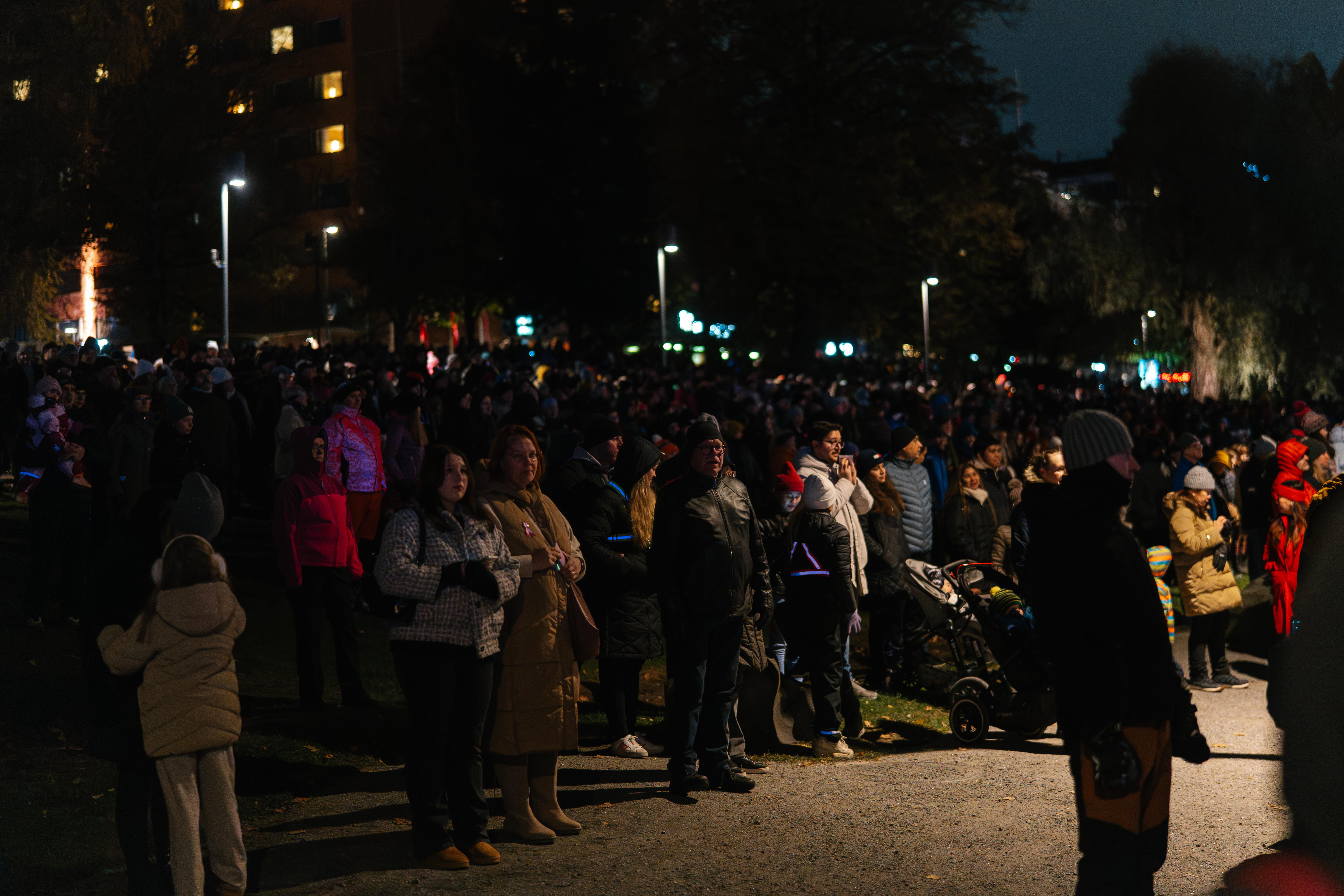 Tampere Festival of Light audience in Koskipuisto Park.