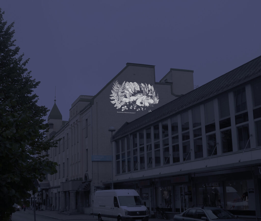 Moomin themed light installations reflected on a building wall.